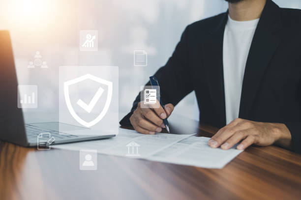 Man using computer buy insurance online at home